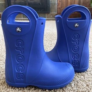Crocs size 13 rubber boots.